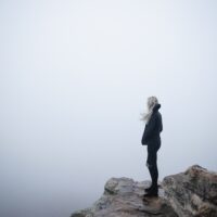 Girl on Mountain top.